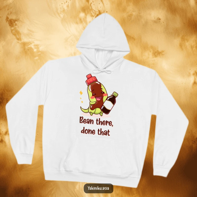 Funny edamame hoodie with a cheerful grinning bean character playfully interacting with a soy sauce bottle.